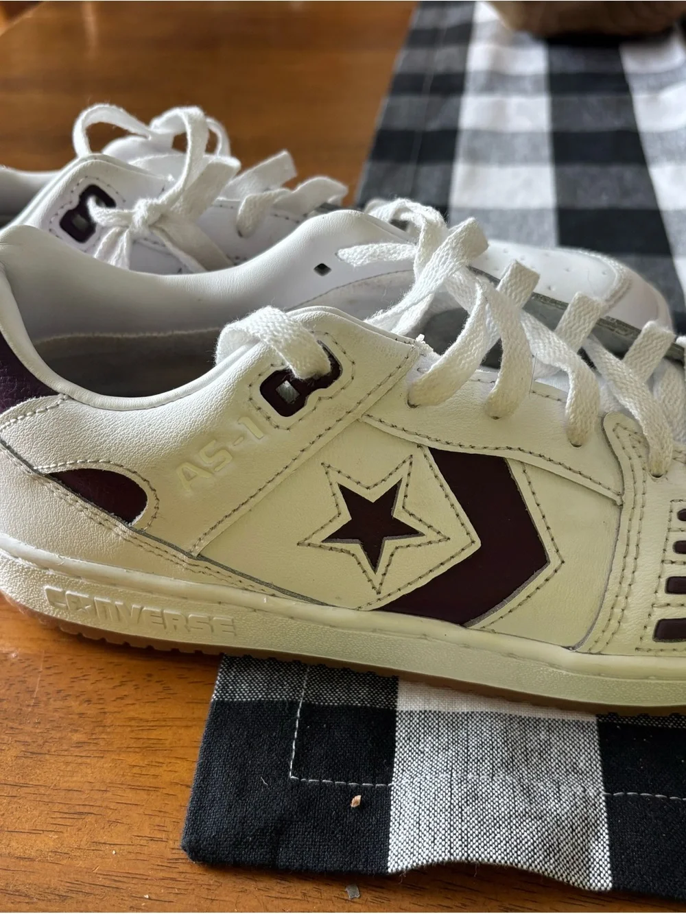 Converse Women’s Low-Top Sneakers in White and purple